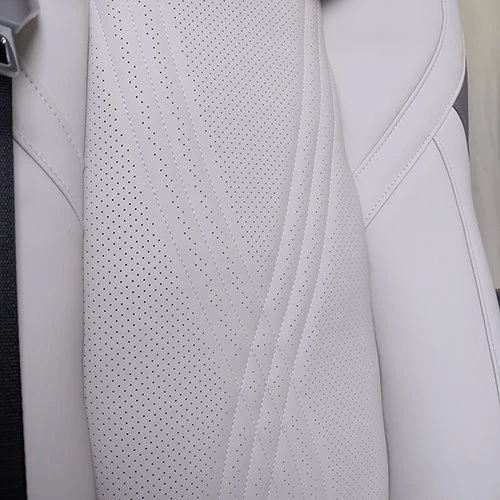 luxury captain's chair perforated leather texture